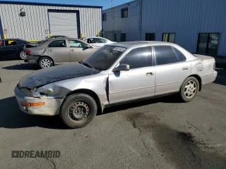 1994 Toyota Camry LE z VIN 4T1GK12E2RU004690, wystawiony jako Copart lot #58017435 z przebiegiem 249 451 mil mil oraz Szkoda całkowita • Salvage title. Historia ofert i sprzedaży dostępna na DreamBid. Obrazek 1.