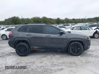 2022 Jeep Cherokee X with VIN 1C4PJMCX0ND538919, listed as a IAAI auction lot 41321416 with 65,577 mi miles. Bid and sale history available at carsss.com. Image 13.