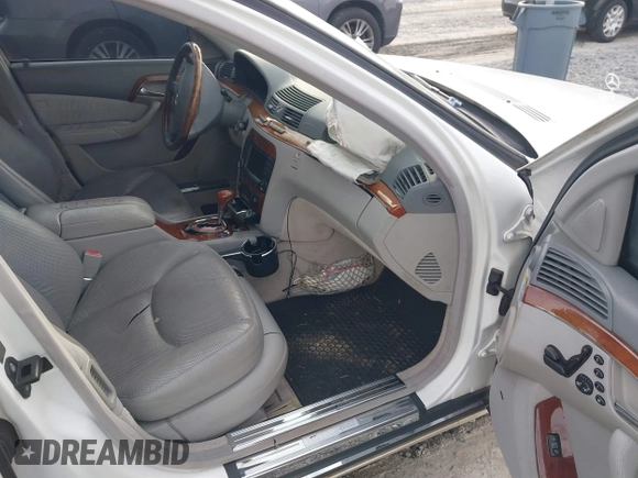 2003 Mercedes-Benz S-Class 4.3L with VIN WDBNG70J83A318268, listed as a IAAI auction lot 41380963 with 243,734 mi miles. Bid and sale history available at carsss.com. Image 5.