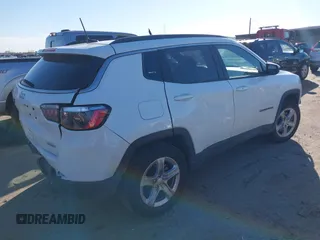 2023 Jeep Compass Latitude with VIN 3C4NJDBN9PT506040, listed as a IAAI auction lot 41483552 with 24,009 mi miles and . Bid and sale history available at DreamBid. Image 4.