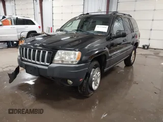 2004 Jeep Grand Cherokee Laredo with VIN 1J4GW48N84C367215, listed as a IAAI auction lot 41352098 with 165,485 mi miles and . Bid and sale history available at DreamBid. Image 17.