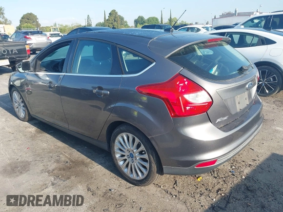 2012 Ford Focus Titanium with VIN 1FAHP3N22CL200249, listed as a IAAI auction lot 42149873 with 103,805 mi miles and . Bid and sale history available at carsss.com. Image 3.