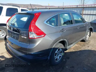 2014 Honda CR-V LX with VIN 2HKRM4H39EH634676, listed as a IAAI auction lot 41233279 with 153,761 mi miles and . Bid and sale history available at carsss.com. Image 4.