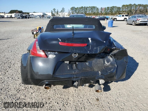 2014 Nissan 370Z Touring with VIN JN1AZ4FH3EM620195, listed as a Copart auction lot 83207104 with 66,974 mi miles and Salvage Title. Bid and sale history available at DreamBid. Image 6.