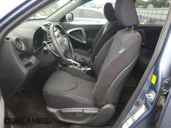2010 Toyota RAV4 Sport with VIN JTMRF4DV3AD023902, listed as a Copart auction lot 60986045 with 155,321 mi miles and Salvage title. Bid and sale history available at DreamBid. Image 7.