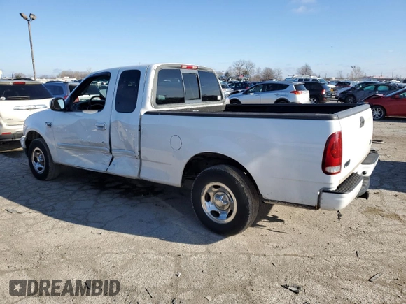 2000 Ford F-150 XL with VIN 1FTRX17L8YNB40935, listed as a Copart auction lot 86726884 with 260,636 mi miles and Salvage Title. Bid and sale history available at carsss.com. Image 2.