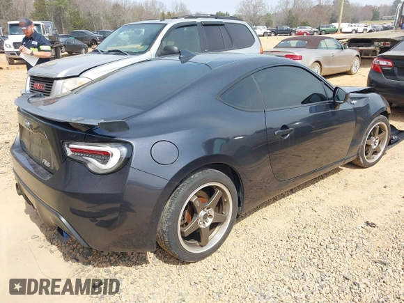 2016 Scion FR-S with VIN JF1ZNAA13G9702833, listed as a IAAI auction lot 41795687 with 71,161 mi miles and . Bid and sale history available at carsss.com. Image 4.