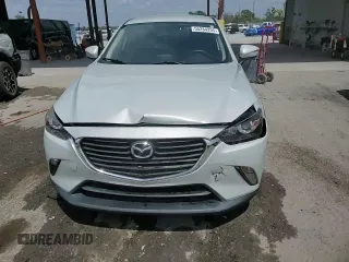 2017 Mazda CX-3 Touring z VIN JM1DKDC78H0150588, wystawiony jako Copart lot #55284205 z przebiegiem 78 923 mil mil oraz Szkoda całkowita • Salvage title. Historia ofert i sprzedaży dostępna na DreamBid. Obrazek 14.