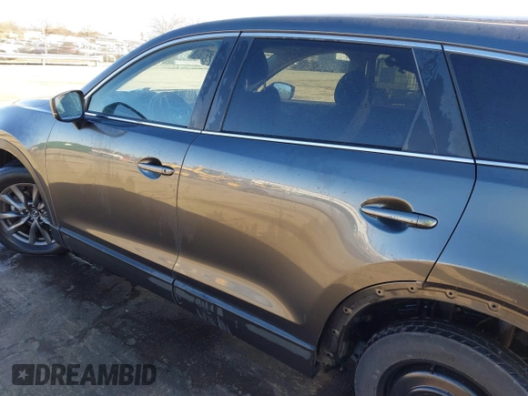 2022 Mazda CX-9 Sport with VIN JM3TCBBY5N0614589, listed as a IAAI auction lot 41295944 with 49,193 mi miles and . Bid and sale history available at DreamBid. Image 14.