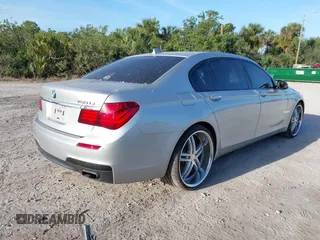 2013 BMW 7 Series 750Li xDrive with VIN WBAYF8C52DD140831, listed as a IAAI auction lot 41941071 with 207,251 mi miles. Bid and sale history available at carsss.com. Image 4.