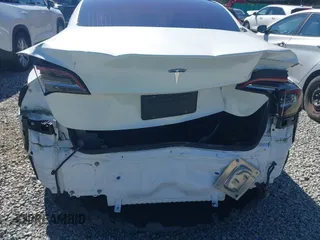 2018 Tesla Model 3 Long Range Battery with VIN 5YJ3E1EA7JF020173, listed as a IAAI auction lot 42046312 with 83,395 mi miles and . Bid and sale history available at DreamBid. Image 6.