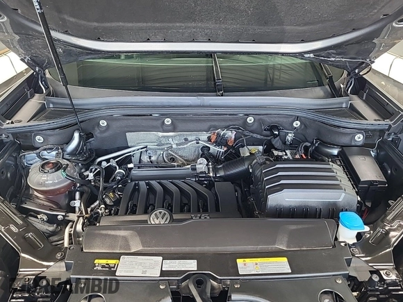 2023 Volkswagen Atlas SE z VIN 1V2HR2CA5PC526012, wystawiony jako IAAI lot #42796408 z przebiegiem 41 216 mil mil oraz . Historia ofert i sprzedaży dostępna na DreamBid. Obrazek 9.