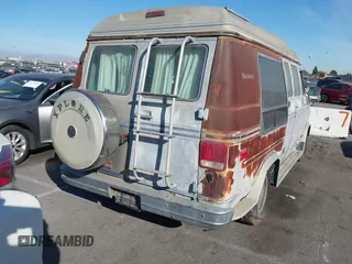 1989 GMC Vandura z VIN 1GDEG25K1K7521984, wystawiony jako IAAI lot #41371811 z przebiegiem 43 502 mil mil oraz . Historia ofert i sprzedaży dostępna na DreamBid. Obrazek 4.
