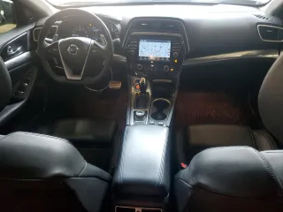 2017 Nissan Maxima SV z VIN 1N4AA6AP0HC402892, wystawiony jako Copart lot #58530165 z przebiegiem 100 628 mil mil oraz Szkoda całkowita • Salvage title. Historia ofert i sprzedaży dostępna na DreamBid. Obrazek 8.