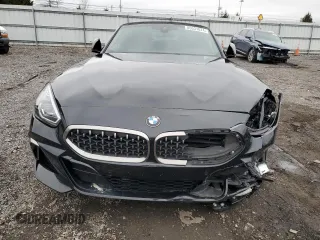 2020 BMW Z4 sDriveM40i with VIN WBAHF9C01LWW56725, listed as a Copart auction lot 85531074 with 0 mi miles and Salvage Title. Bid and sale history available at carsss.com. Image 5.