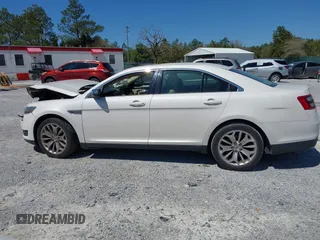 2016 Ford Taurus Limited with VIN 1FAHP2F80GG110898, listed as a IAAI auction lot 41808251 with 95,318 mi miles and . Bid and sale history available at DreamBid. Image 14.