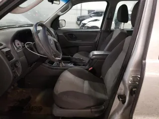 2007 Ford Escape XLS with VIN 1FMCU92Z77KA84801, listed as a Copart auction lot 82052144 with 180,774 mi miles and Salvage title. Bid and sale history available at DreamBid. Image 7.