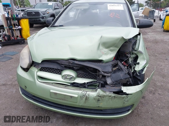 2008 Hyundai Accent GS with VIN KMHCM36C48U073067, listed as a IAAI auction lot 42055217 with 173,949 mi miles. Bid and sale history available at carsss.com. Image 6.
