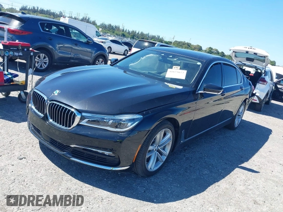 2018 BMW 7 Series 750i with VIN WBA7F0C54JGM22900, listed as a IAAI auction lot 41673673 with 66,264 mi miles. Bid and sale history available at carsss.com. Image 16.