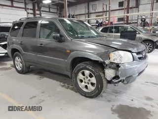 2002 Mazda Tribute LX with VIN 4F2CU08132KM39554, listed as a IAAI auction lot 42015060 with 99,128 mi miles and . Bid and sale history available at carsss.com. Image 1.