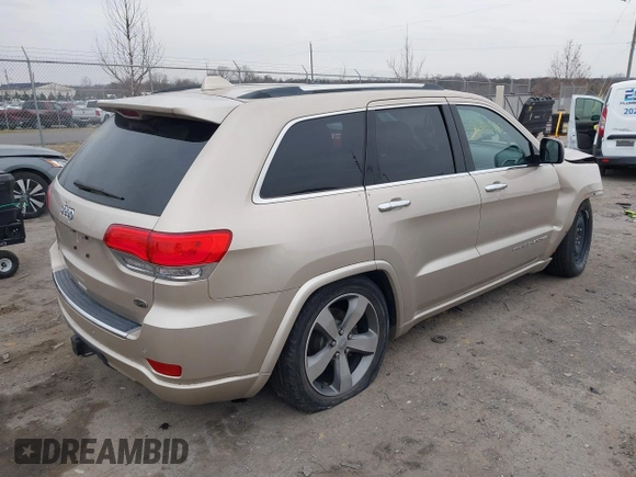 2015 Jeep Grand Cherokee Overland with VIN 1C4RJFCG5FC928085, listed as a IAAI auction lot 41540870 with 93,846 mi miles. Bid and sale history available at carsss.com. Image 4.