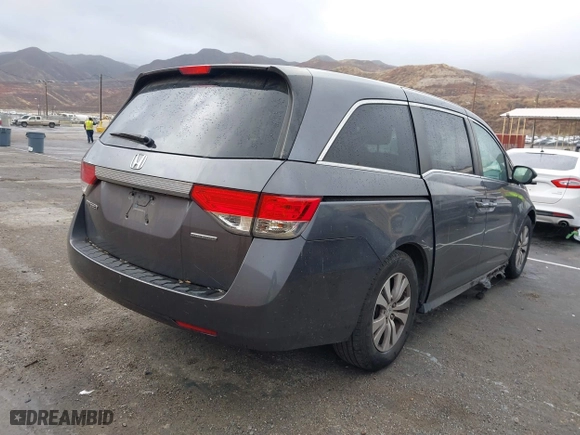 2016 Honda Odyssey SE with VIN 5FNRL5H30GB034980, listed as a IAAI auction lot 41512117 with 97,644 mi miles. Bid and sale history available at carsss.com. Image 4.