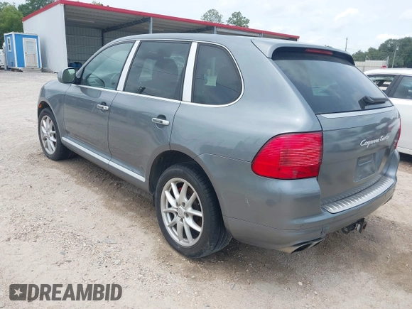 2005 Porsche Cayenne Turbo z VIN WP1AC29P25LA90019, wystawiony jako IAAI lot #42295764 z przebiegiem 164 927 mil mil oraz . Historia ofert i sprzedaży dostępna na DreamBid. Obrazek 3.