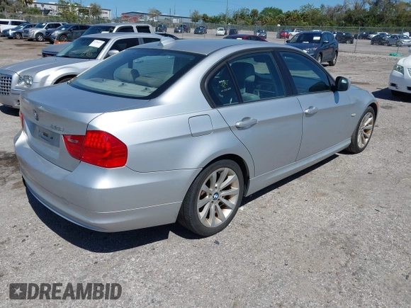 2011 BMW 3 Series 328i with VIN WBAPH7G57BNM57845, listed as a IAAI auction lot 41803365 with 243,952 mi miles. Bid and sale history available at carsss.com. Image 4.