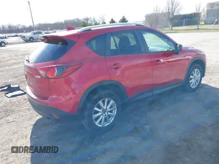 2016 Mazda CX-5 Touring with VIN JM3KE4CY5G0816285, listed as a IAAI auction lot 41888537 with 101,598 mi miles. Bid and sale history available at carsss.com. Image 4.