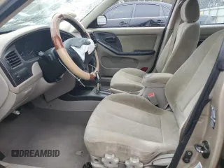 2003 Hyundai Elantra GLS z VIN KMHDN45D43U663926, wystawiony jako Copart lot #50036625 z przebiegiem 152 174 mil mil oraz Szkoda całkowita • Salvage title. Historia ofert i sprzedaży dostępna na DreamBid. Obrazek 7.