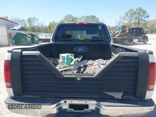 2003 Ford F-150 XL with VIN 1FTRX17L03NA16778, listed as a IAAI auction lot 41602179 with 219,101 mi miles. Bid and sale history available at carsss.com. Image 8.