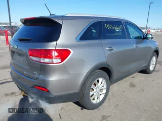 2016 Kia Sorento LX with VIN 5XYPGDA58GG178903, listed as a IAAI auction lot 41968619 with 146,853 mi miles and . Bid and sale history available at carsss.com. Image 4.