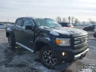 2015 GMC Canyon 4WD SLE z VIN 1GTG6BE31F1270675, wystawiony jako IAAI lot #41407183 z przebiegiem 143 117 mil mil oraz . Historia ofert i sprzedaży dostępna na DreamBid. Obrazek 6.
