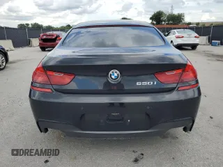 2015 BMW 6 Series 650i z VIN WBA6B2C5XFD130082, wystawiony jako Copart lot #58449885 z przebiegiem Nie podano mil oraz Czysty tytuł • Clean title. Historia ofert i sprzedaży dostępna na DreamBid. Obrazek 6.