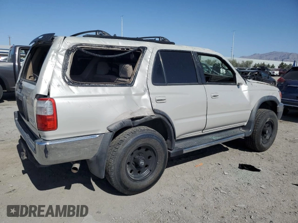 1999 Toyota 4Runner SR5 with VIN JT3GN86R4X0099618, listed as a Copart auction lot 58204145 with 297,759 mi miles and Salvage title. Bid and sale history available at DreamBid. Image 3.