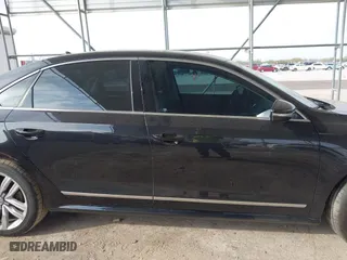 2017 Volkswagen Passat 1.8T SE w/Technology with VIN 1VWGT7A36HC074702, listed as a IAAI auction lot 41805024 with 124,857 mi miles. Bid and sale history available at carsss.com. Image 13.