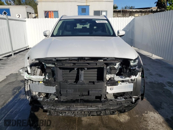 2025 Mazda CX-90 Select z VIN JM3KKAHD9S1193298, wystawiony jako Copart lot #45603925 z przebiegiem 8 915 mil mil oraz Czysty tytuł • Clean title. Historia ofert i sprzedaży dostępna na DreamBid. Obrazek 5.