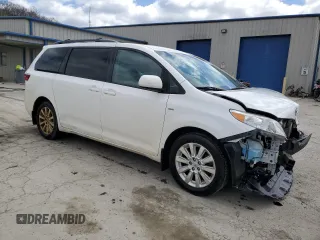 2016 Toyota Sienna LE with VIN 5TDJK3DC3GS131175, listed as a Copart auction lot 52520595 with 107,001 mi miles and Salvage Title. Bid and sale history available at carsss.com. Image 4.
