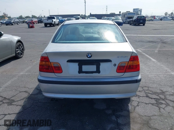 2002 BMW 3 Series 325i with VIN WBAET37492NG83135, listed as a IAAI auction lot 42028502 with 184,216 mi miles. Bid and sale history available at carsss.com. Image 16.