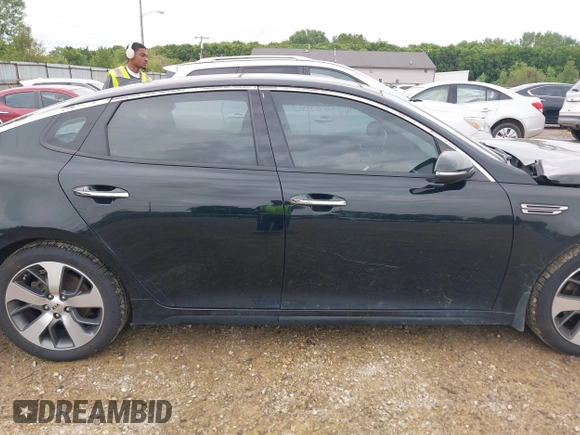2019 Kia Optima LX z VIN 5XXGT4L3XKG297461, wystawiony jako IAAI lot #42322350 z przebiegiem 103 660 mil mil oraz . Historia ofert i sprzedaży dostępna na DreamBid. Obrazek 13.