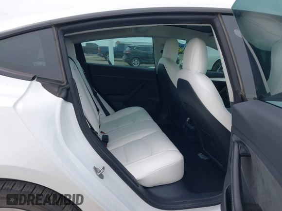 2022 Tesla Model 3 Long Range z VIN 5YJ3E1EB7NF241075, wystawiony jako IAAI lot #42217269 z przebiegiem 28 856 mil mil oraz . Historia ofert i sprzedaży dostępna na DreamBid. Obrazek 8.