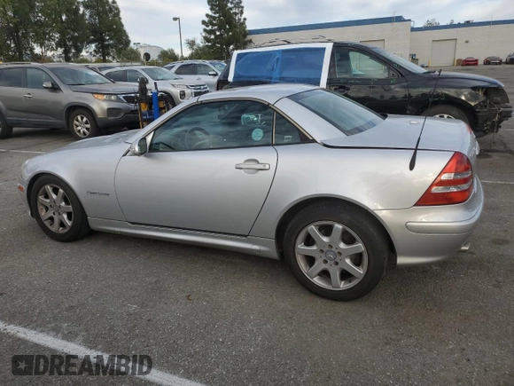 2001 Mercedes-Benz SLK 230 Kompressor with VIN WDBKK49F21F193606, listed as a Copart auction lot 47139945 with 156,424 mi miles and Salvage title. Bid and sale history available at DreamBid. Image 2.