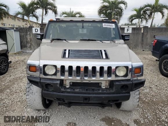 2006 Hummer H2 z VIN 5GRGN23U26H101561, wystawiony jako Copart lot #89308685 z przebiegiem 327 103 mil mil oraz Tytuł czysty. Historia ofert i sprzedaży dostępna na DreamBid. Obrazek 5.