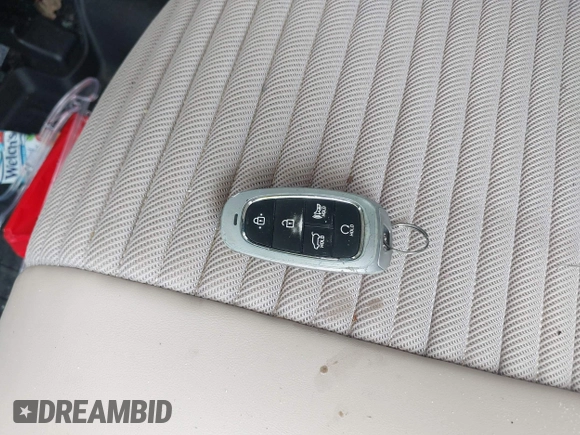 2022 Hyundai Tucson SEL z VIN 5NMJC3AE3NH057663, wystawiony jako IAAI lot #42428386 z przebiegiem 78 740 mil mil oraz . Historia ofert i sprzedaży dostępna na DreamBid. Obrazek 11.