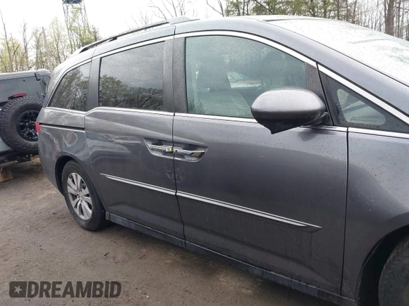 2014 Honda Odyssey EX-L with VIN 5FNRL5H63EB033684, listed as a IAAI auction lot 42025249 with 128,017 mi miles and . Bid and sale history available at carsss.com. Image 13.