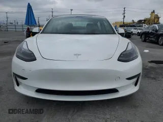 2023 Tesla Model 3 с VIN 5YJ3E1EA3PF557941, выставлен на аукционе Copart как лот 53047505 с пробегом 53 060 миль миль и Списание • Salvage title. История ставок и продаж доступна на DreamBid. Изображение 5.
