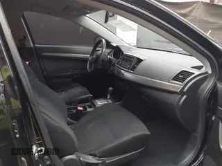 2015 Mitsubishi Lancer ES with VIN JA32U2FU0FU021482, listed as a IAAI auction lot 42159094 with 79,831 mi miles and . Bid and sale history available at DreamBid. Image 5.