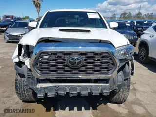 2019 Toyota Tacoma 4WD SR with VIN 3TMCZ5AN3KM207007, listed as a IAAI auction lot 41755529 with 43,203 mi miles. Bid and sale history available at carsss.com. Image 12.