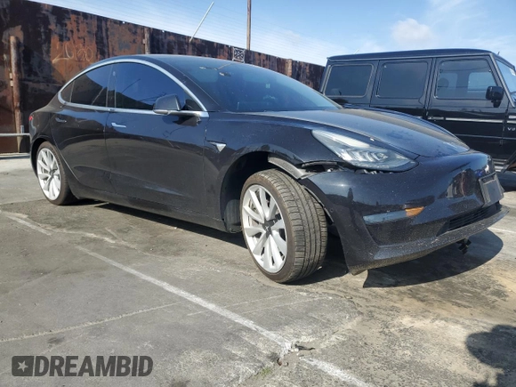 2018 Tesla Model 3 Long Range Battery z VIN 5YJ3E1EB7JF071438, wystawiony jako Copart lot #52996665 z przebiegiem 73 881 mil mil oraz Szkoda całkowita • Salvage title. Historia ofert i sprzedaży dostępna na DreamBid. Obrazek 4.