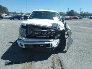 2014 Ford F-150 XL with VIN 1FTFX1EF3EKD09207, listed as a IAAI auction lot 42051107 with 106,664 mi miles. Bid and sale history available at carsss.com. Image 12.